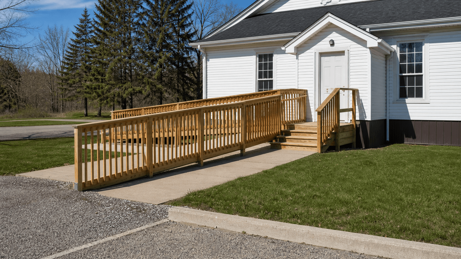 Photorealistic editorial image of a community hall entrance with an accessible wooden ramp.